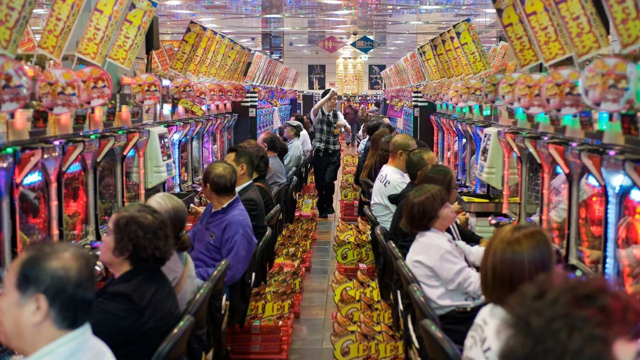 people gambling at a pachinko parlor